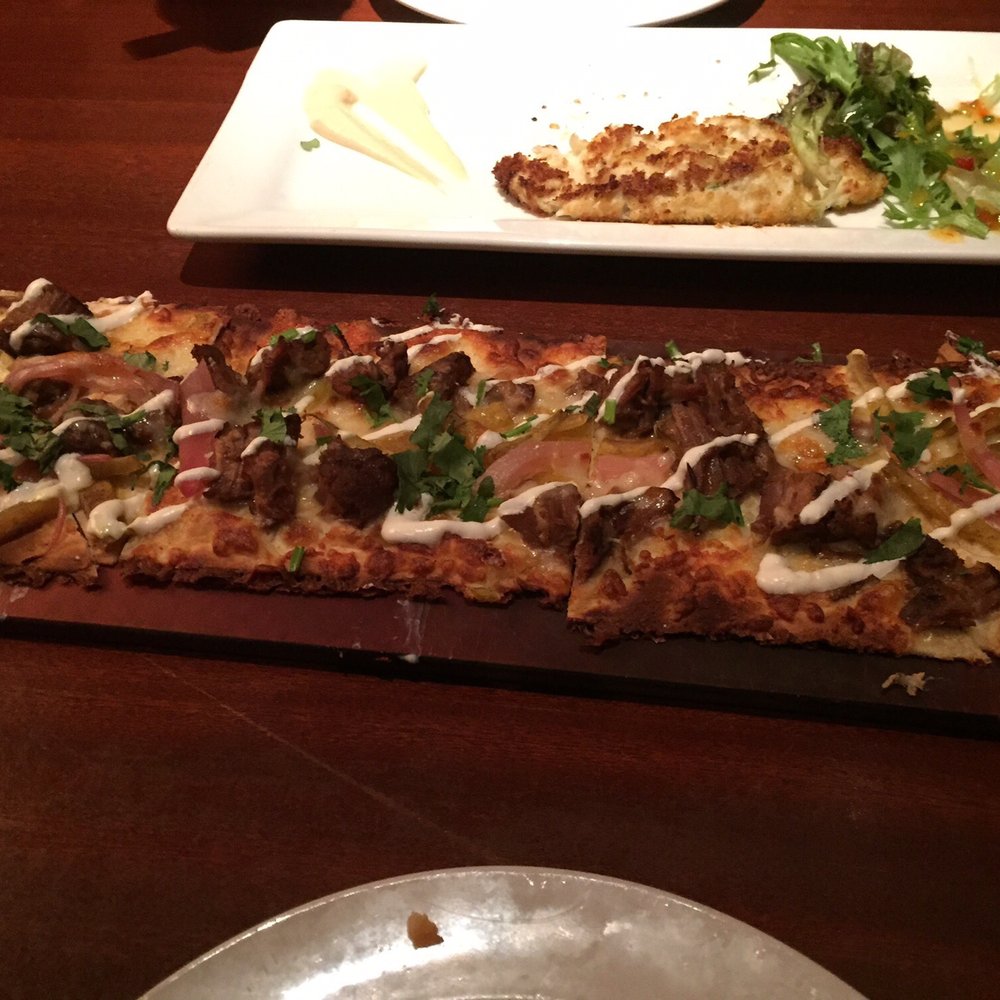 Seasons 52 - Beef tip flat bread. - New American Near Me - Schaumburg, Illinois Seasons 52 - Beef tip flat bread. - New American Near Me - Schaumburg, Illinois