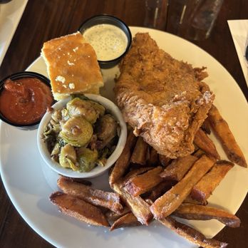 The Craft Bar - Lunch plate with fried chicken, french fries, Brussel sprouts, and cornbread, with a side of spicy ketchup and ranch - Burgers Near Me - Miramar Beach, Florida The Craft Bar - Lunch plate with fried chicken, french fries, Brussel sprouts, and cornbread, with a side of spicy ketchup and ranch - Burgers Near Me - Miramar Beach, Florida
