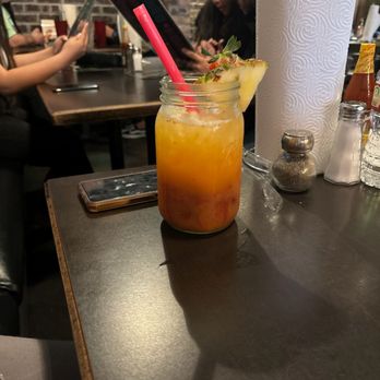 Dona Leti's - A delicious pineapple strawberry punch non alcohol - Cocktail Bars Near Me - Houston, Texas