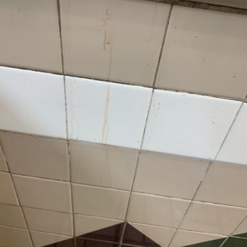 Carl's Jr - a dirty bathroom floor - Fast Food Near Me - Mammoth Lakes, California