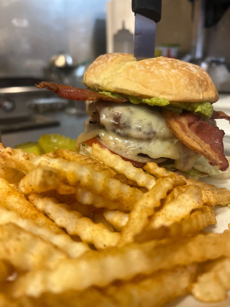 Big Guy Sport Club & Restaurant Logo