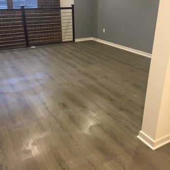 Freddy's Flooring - an empty room with wood floors - Flooring Near Me