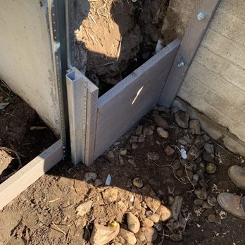 Aanco Fence - "retaining wall". This went all the way up to the top of both retaining walls on fence line. - Fences & Gates Near Me Aanco Fence - "retaining wall". This went all the way up to the top of both retaining walls on fence line. - Fences & Gates Near Me