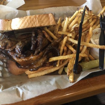 Hole In the Wall - Brisket served on Texas toast with fries, cole slaw, pickle. - Sports Bars Near Me - Miami, Florida Hole In the Wall - Brisket served on Texas toast with fries, cole slaw, pickle. - Sports Bars Near Me - Miami, Florida