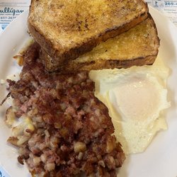 Meeks Mill Restaurant - Two eggs, corn beef hash, and wheat toast