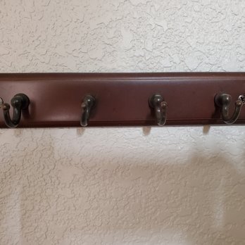 Robbie's Painting - Key holder at the entrance door. Notice the two colored screw used. Lousy job by Robbie. - Painters Near Me Robbie's Painting - Key holder at the entrance door. Notice the two colored screw used. Lousy job by Robbie. - Painters Near Me