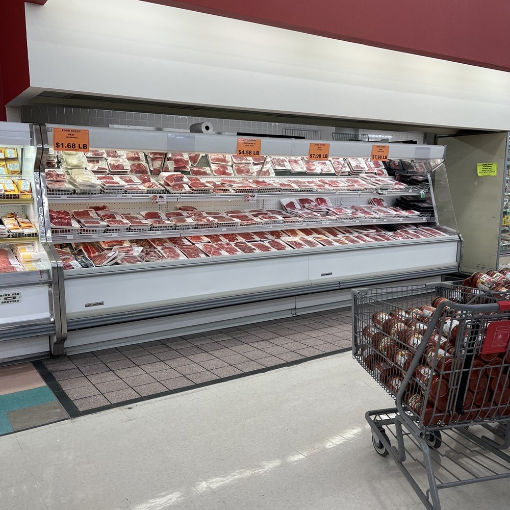 Food Depot - a shopping cart in front of a meat display - Grocery Near Me - Stockbridge, Georgia Food Depot - a shopping cart in front of a meat display - Grocery Near Me - Stockbridge, Georgia