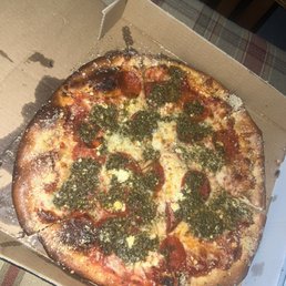 Custom small pizza! Red sauce, cheese, Feta cheese, garlic, and pesto well done