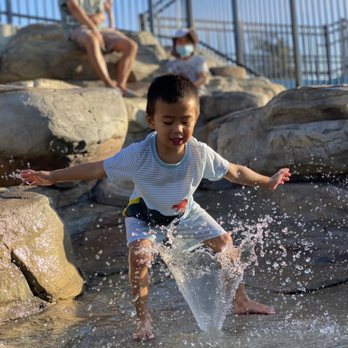 Magical Bridge Playground - Artificial rock climbing/seating area with little fountains and a waterfall - Playgrounds Near Me - Redwood City, California Magical Bridge Playground - Artificial rock climbing/seating area with little fountains and a waterfall - Playgrounds Near Me - Redwood City, California