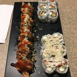 Sushi Cushi - Sun Tan Salmon, Cranky Monkey Roll, and behind is Philadelphia Roll
