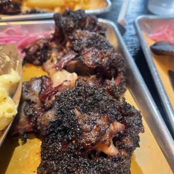 Sanders BBQ Supply - Smoked oxtails, beef ribs, Mac and cheese, and sweet potato cornbread. - Salad Near Me - Chicago, Illinois Sanders BBQ Supply - Smoked oxtails, beef ribs, Mac and cheese, and sweet potato cornbread. - Salad Near Me - Chicago, Illinois