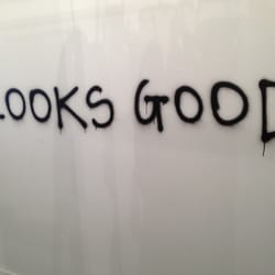 Laundromat Boutique - The changing room wall says it like it is!