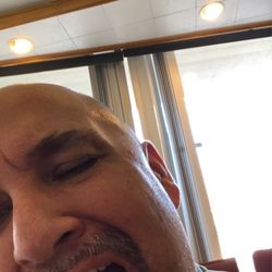 Trambas Constantine, DDS - Lol pointing to the tooth leaving today