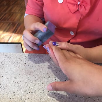 Hands Feet Love Nail - MoMo working her magic on my nails! - Nail Salons Near Me - Gravesend, New York