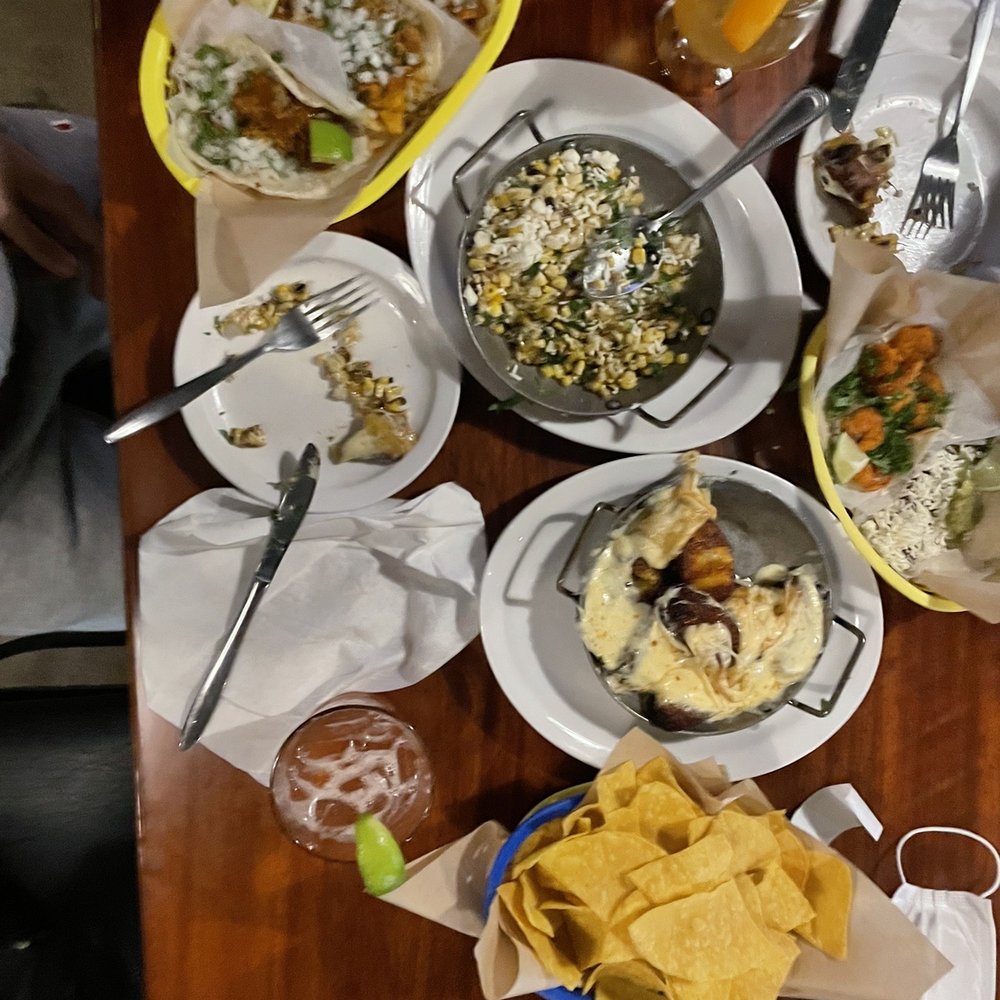 Naco Taco - a table full of mexican food - Mexican Near Me - Cambridge, Massachusetts Naco Taco - a table full of mexican food - Mexican Near Me - Cambridge, Massachusetts