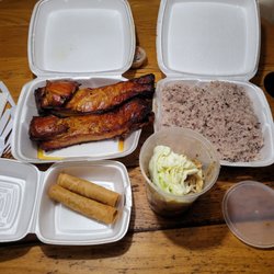 Yang’s Restaurant - Smoked pork Billy's, purple sticky rice, papaya salad, and two eggrolls.