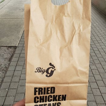 Big G Fried Chicken Steaks - a person holding a bag - Taiwanese Near Me - Vancouver, British Columbia Big G Fried Chicken Steaks - a person holding a bag - Taiwanese Near Me - Vancouver, British Columbia