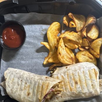 Dip and Happy - The chicken kebab wrap. (but honestly, they caught something else on the menu.) - Breakfast & Brunch Near Me - Tampa, Florida