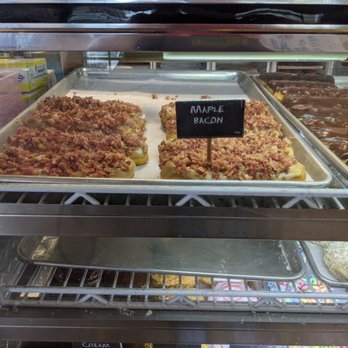 Hurts Donut - So much bacon you can barely see the maple glaze. How did I get so lucky?! - Donuts Near Me - West Des Moines, Iowa Hurts Donut - So much bacon you can barely see the maple glaze. How did I get so lucky?! - Donuts Near Me - West Des Moines, Iowa