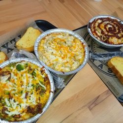 Roni’s Mac Bar - Mine, my daughter and her wife's bowls. I got the cheesey garlic bread