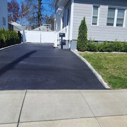 D&L Seal Coating - Freshly coated driveway.