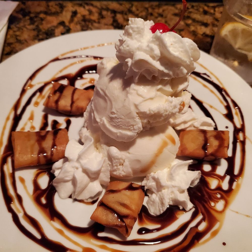 Ploy Thai - Coconut ice cream with fried bananas, delicious! - Thai Near Me - Brandon, Florida Ploy Thai - Coconut ice cream with fried bananas, delicious! - Thai Near Me - Brandon, Florida