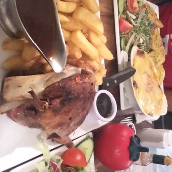 The Pheasant Restaurant - 1/2 lamb shoulder for me the beef lasagna for him - British Near Me - Hillingdon, XGL The Pheasant Restaurant - 1/2 lamb shoulder for me the beef lasagna for him - British Near Me - Hillingdon, XGL