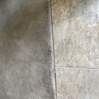 Atlas Real Estate - Carpet pulling up and nails sticking out - Real Estate Services Near Me - Denver, Colorado