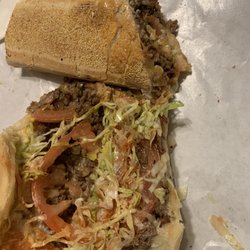 Puchu's Grocery and Deli - Inside of the $5 cheese steak, it's good but it comes with mayo if you tell them you want everything