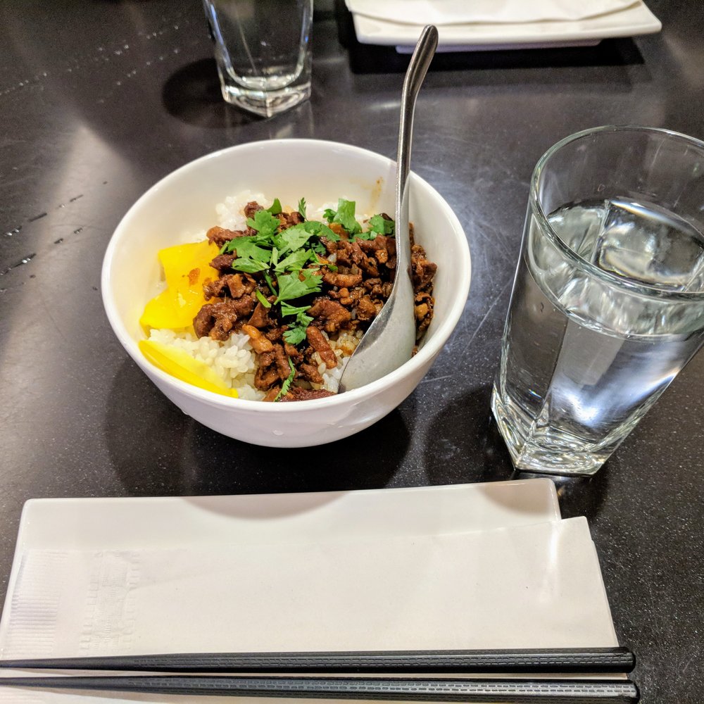 Facing East - Braised pork stew over rice. - Chinese Near Me - Bellevue, Washington Facing East - Braised pork stew over rice. - Chinese Near Me - Bellevue, Washington