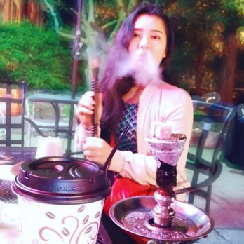 Prince Hookah - a woman smoking a hookah - Hookah Bars Near Me - Louisville, Kentucky Prince Hookah - a woman smoking a hookah - Hookah Bars Near Me - Louisville, Kentucky