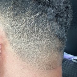 In The Cut Barbershop - The guy didn't finish the line leaving it crisp.there are still hairs coming off the line.