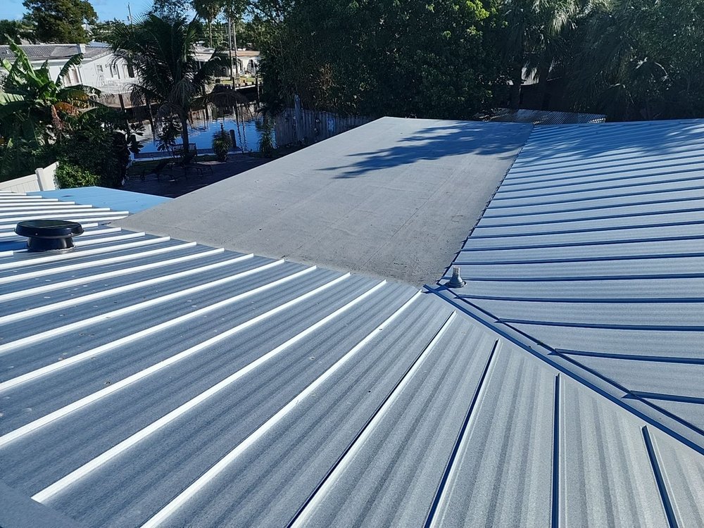 Slide of Dream Team Roofing