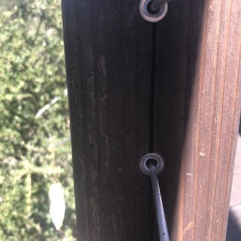 Quartz Construction Remodeling - Poles cracked top to bottom as the wire holders were jammed into holes too small for them. - General Contractors Near Me - San Jose, California