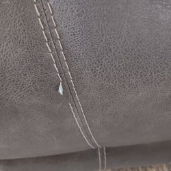 Sam’s Furniture Outlet - Stitching pulling loose. There is no seam separation .