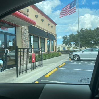 Chick-fil-A - ows an american flag flying in front of a restaurant - Fast Food Near Me - Wilmington, North Carolina Chick-fil-A - ows an american flag flying in front of a restaurant - Fast Food Near Me - Wilmington, North Carolina