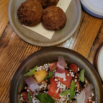 Husk Savannah - Pimento cheese profiteroles and an Heirloom tomato & GA peaches salad - Southern Near Me - Savannah, Georgia