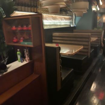 Lee's - Host stand with seating (poor quality picture) - Cocktail Bars Near Me - Houston, Texas