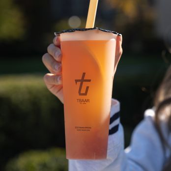 TBaar - Eagan - a person holding a drink - Bubble Tea Near Me - Eagan, Minnesota TBaar - Eagan - a person holding a drink - Bubble Tea Near Me - Eagan, Minnesota