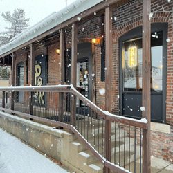 The Pour Haus - The entrance of The Pour Haus during a winter snow day.