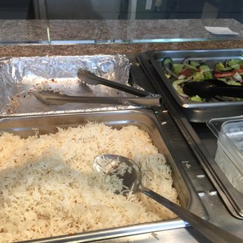 Curries - The only salad available is on the right of the pic and the empty one on the left is where the naan was - Indian Near Me - Everett, Washington