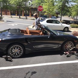 Car had to be skated to move to a towable location, tight parking lot.