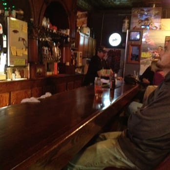 Snag Bar - a man sitting at the bar - Bars Near Me - Red Lodge, Montana
