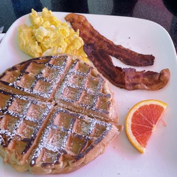 Cilantro Grill - Might look a little crispy but this waffle was excellent. Great breakfast spot on the circle (upstairs level) - Creperies Near Me - Sarasota, Florida
