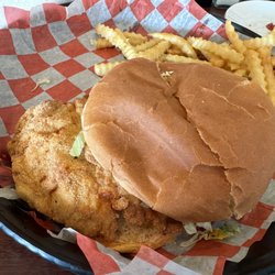 Carlyle's Restaurant - Perfectly dressed breaded pork tenderloin sandwich