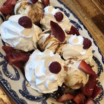 Ambriza - Churros, caramelized plantains, cajeta drizzle and vanilla ice cream with strawberries - Mexican Near Me - Houston, Texas Ambriza - Churros, caramelized plantains, cajeta drizzle and vanilla ice cream with strawberries - Mexican Near Me - Houston, Texas