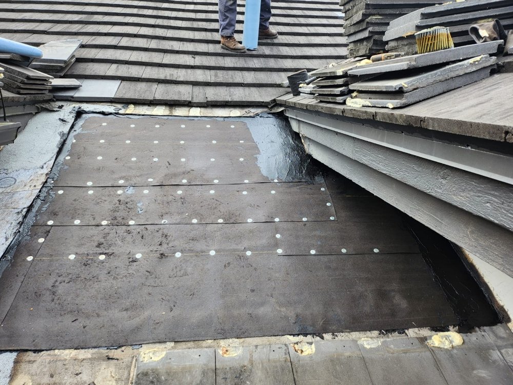 Slide of Extra Myles Roofing