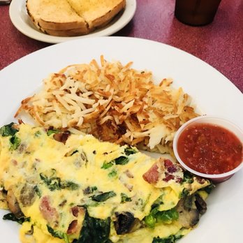 Nick's West Side - BYOO (Build Your Own Omelette) with hash brown and sourdough toast. - Breakfast & Brunch Near Me - Sedona, Arizona Nick's West Side - BYOO (Build Your Own Omelette) with hash brown and sourdough toast. - Breakfast & Brunch Near Me - Sedona, Arizona