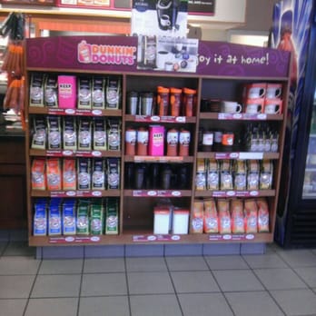 Dunkin' -  a display of various products in a store - Donuts Near Me - Wrentham, Massachusetts