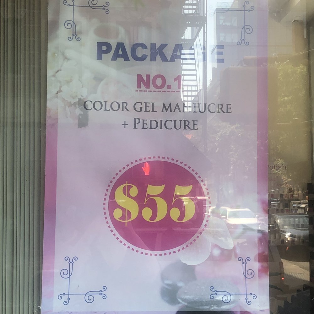 The sign that says "package no. 1 gel color manicure & pedicure $55". So misleading